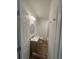 Bathroom featuring a single vanity, toilet, and bathtub with tiled walls at 2041 Olive Springs Rd, Marietta, GA 30060