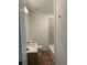 Bathroom featuring a single vanity, toilet, and bathtub with tiled walls at 2041 Olive Springs Rd, Marietta, GA 30060