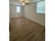 Bedroom featuring hardwood floors, white walls and natural light at 2041 Olive Springs Rd, Marietta, GA 30060