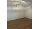 Dining room featuring hardwood floors and decorative light fixture at 2041 Olive Springs Rd, Marietta, GA 30060