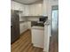 Bright kitchen featuring stainless steel appliances and stone countertops at 2041 Olive Springs Rd, Marietta, GA 30060
