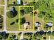 Aerial view of a property surrounded by trees, with the property line marked in yellow at 282 Oak Rdg, Auburn, GA 30011