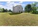 Home's back yard, including grass, fencing and mature tree at 282 Oak Rdg, Auburn, GA 30011