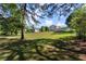 View of the back of the home with fenced-in yard at 282 Oak Rdg, Auburn, GA 30011