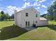 Exterior view of home featuring back yard with patio, lawn and fenced in space at 282 Oak Rdg, Auburn, GA 30011