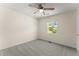Bedroom featuring a ceiling fan, neutral paint, and carpet at 282 Oak Rdg, Auburn, GA 30011