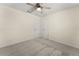 A standard bedroom with two closets, carpet, and a ceiling fan at 282 Oak Rdg, Auburn, GA 30011
