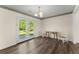 Dining room with french doors leading to the outdoors and hardwood floors at 282 Oak Rdg, Auburn, GA 30011