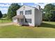 Side yard view of a home featuring well-kept yard and exterior at 282 Oak Rdg, Auburn, GA 30011