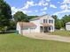A house with a garage and a well-kept front yard at 282 Oak Rdg, Auburn, GA 30011