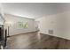 Bright living room with new floors, fireplace, and plenty of natural light at 282 Oak Rdg, Auburn, GA 30011