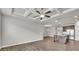 Open concept living room with modern kitchen, an island, stainless appliances, and hardwood style floors at 3477 Ivy Birch Way, Buford, GA 30519