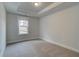 Bedroom with carpet and a view through a window at 4032 Andover Cir, Mcdonough, GA 30252