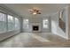 Spacious living room featuring hardwood floors, a fireplace, and a staircase at 4032 Andover Cir, Mcdonough, GA 30252