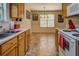 Functional kitchen with plenty of counter space and a dining area nearby at 265 Oak Hill Dr, Covington, GA 30016