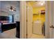 Convenient laundry room located near the main bedroom for added convenience at 265 Oak Hill Dr, Covington, GA 30016