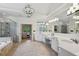 Elegant bathroom with double vanities, glass shower, soaking tub, and plenty of natural light at 3687 Canyon Ridge Ne Ct, Brookhaven, GA 30319
