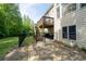 Enjoy outdoor living with a deck, stone patio, and fenced backyard. Perfect for relaxing or entertaining at 3705 Rolling Creek Dr, Buford, GA 30519