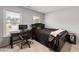 Bedroom featuring a desk, rolling chair and dark furniture set at 3705 Rolling Creek Dr, Buford, GA 30519