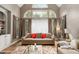 Bright living room with cathedral ceiling and hardwood floors at 3705 Rolling Creek Dr, Buford, GA 30519