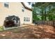 Expansive backyard featuring a patio, and fenced in area at 4271 Haywater Cv, Buford, GA 30519