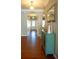 Welcoming entryway with hardwood flooring, neutral walls, and decorative accents at 4271 Haywater Cv, Buford, GA 30519