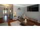 Cozy living room with a comfortable seating area, stylish decor, and seamless transition to other areas of the home at 4271 Haywater Cv, Buford, GA 30519