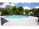 Community pool with a shallow end and lounge area at 4271 Haywater Cv, Buford, GA 30519