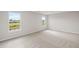 Bright bedroom with plush carpeting and scenic views at 107 Cherry Glen Way, Euharlee, GA 30145