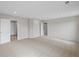 Spacious bonus room with neutral carpeting, recessed lighting, and multiple doorways for versatile use at 107 Cherry Glen Way, Euharlee, GA 30145