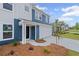 Charming two-story home featuring a blue and white exterior with a manicured lawn at 107 Cherry Glen Way, Euharlee, GA 30145