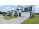 Charming two-story home with a two car garage and manicured lawn at 107 Cherry Glen Way, Euharlee, GA 30145