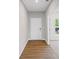 Foyer with hardwood flooring and a view of the front door and an adjacent room at 107 Cherry Glen Way, Euharlee, GA 30145