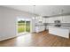 Bright eat-in kitchen with granite countertops, stainless steel appliances and access to the back yard at 107 Cherry Glen Way, Euharlee, GA 30145