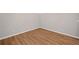 The living room features an open floor plan with wood flooring at 107 Cherry Glen Way, Euharlee, GA 30145