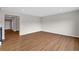 Open living room featuring hardwood floors and neutral colored walls at 107 Cherry Glen Way, Euharlee, GA 30145