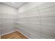 Walk-in pantry features wire shelving and wood-look flooring at 107 Cherry Glen Way, Euharlee, GA 30145