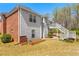View of the home's backyard and lower-level patio at 224 Prominent Loop, Mcdonough, GA 30253
