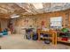 Unfinished basement area with visible insulation and a variety of tools and equipment at 224 Prominent Loop, Mcdonough, GA 30253