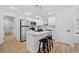 Modern kitchen with an island, stainless steel appliances and sleek cabinets at 2442 Connally Dr, East Point, GA 30344