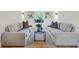 Inviting living room with comfortable sofas and natural light from the window at 2442 Connally Dr, East Point, GA 30344