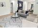 Tastefully decorated living room featuring trendy decor and hardwood flooring at 2442 Connally Dr, East Point, GA 30344