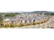 Aerial view of a neighborhood with numerous houses, lush trees, and winding roads at 5247 Flannery Chase Sw, Powder Springs, GA 30127
