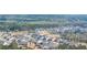 Vast aerial view featuring a planned community with a pool and mature trees in the background at 5247 Flannery Chase Sw, Powder Springs, GA 30127