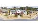 Attractive community clubhouse with manicured lawn, providing a gathering space for residents at 5247 Flannery Chase Sw, Powder Springs, GA 30127