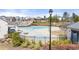 A sparkling community pool with sundeck and landscaped surroundings offers residents a relaxing oasis at 5247 Flannery Chase Sw, Powder Springs, GA 30127