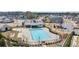 Aerial view featuring the community pool and recreational facilities amidst well-maintained grounds at 5247 Flannery Chase Sw, Powder Springs, GA 30127