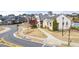 Community clubhouse with manicured lawn, paved walkways, and street access in a residential area at 5247 Flannery Chase Sw, Powder Springs, GA 30127