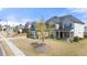 Inviting two-story home with a landscaped yard, stylish exterior finishes, and a well-maintained lawn at 5247 Flannery Chase Sw, Powder Springs, GA 30127