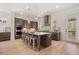Modern kitchen featuring an island, stainless steel appliances, and ample cabinet space at 5247 Flannery Chase Sw, Powder Springs, GA 30127